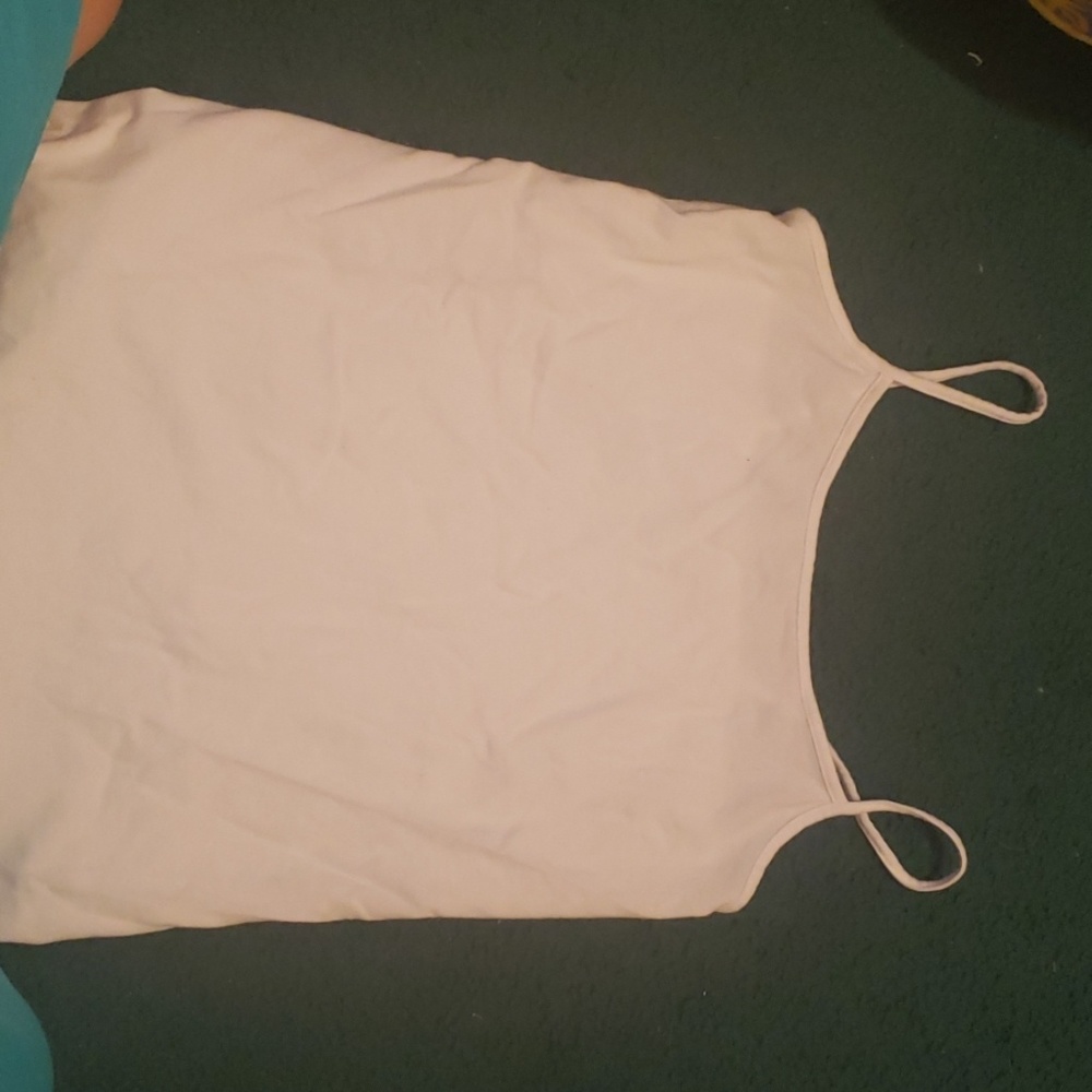 A white cami perfect for under a dress